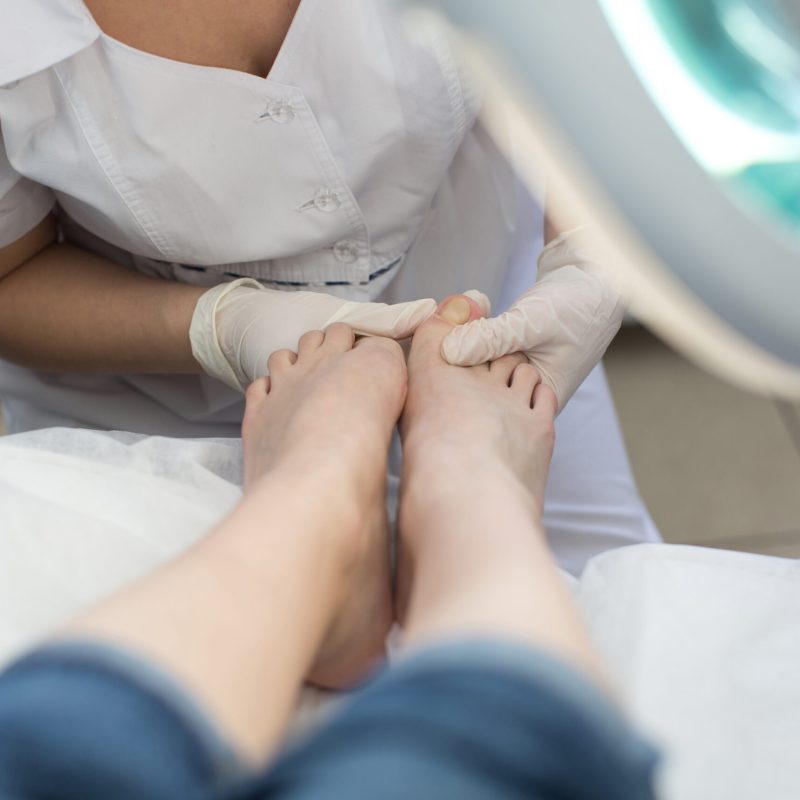 Process pedicure close-up, polishing feet